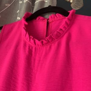 HOT pink sleeveless blouse
